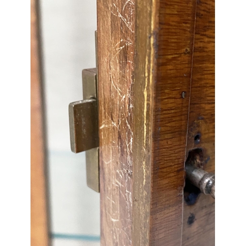 126 - ART DECO DISPLAY CASE, walnut with a pair of glazed doors enclosing shelves and glazed side panels, ... 