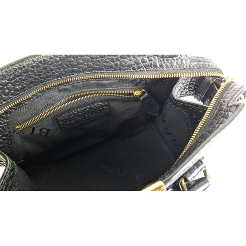 31 - BURBERRY HANDBAG, grained black leather, gold tone hardware and front plaque with logo, two handles,... 