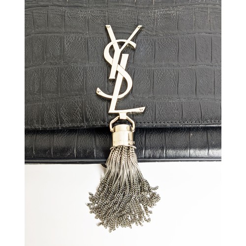 34 - YVES SAINT LAURENT CLUTCH, embossed leather body, metal iconic logo with tassel closure, front flap ... 