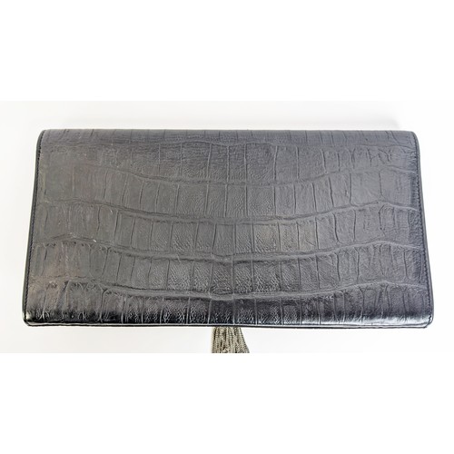 34 - YVES SAINT LAURENT CLUTCH, embossed leather body, metal iconic logo with tassel closure, front flap ... 