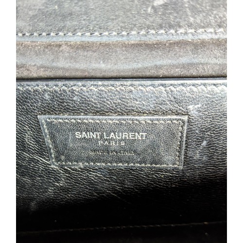 34 - YVES SAINT LAURENT CLUTCH, embossed leather body, metal iconic logo with tassel closure, front flap ... 