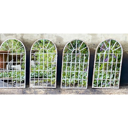 411 - ARCHITECTURAL GARDEN MIRRORS, a set of four, 60cm H x 36cm W, Regency style, with overlaid glazing b... 