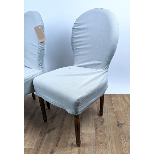 428 - OKA DINING CHAIRS, a set of six each 52cm W, in checked loose covers. (6)