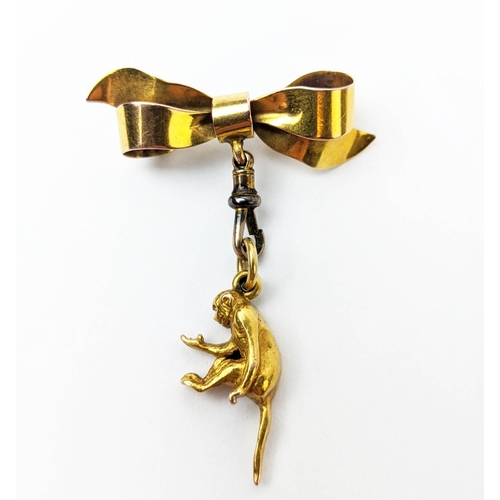 19 - A 9CT GOLD PENDANT BROOCH, in the form of a bow and monkey, an agate pendant and a 9ct gold enamelle... 