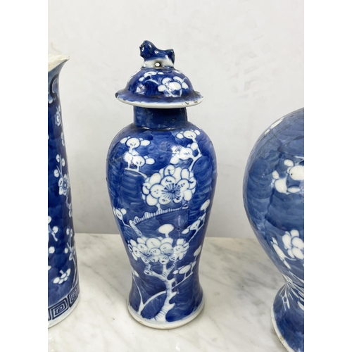 13 - QUANTITY OF CHINESE  BLUE AND WHITE, thirteen in total including sleeve vases, decorated with prunus... 