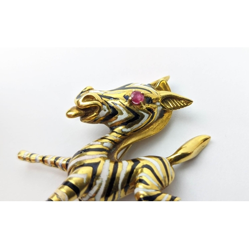 17 - AN 18CT GOLD FAWN BROOCH, enamelled body, set with a ruby eye, 20.66 grams.
