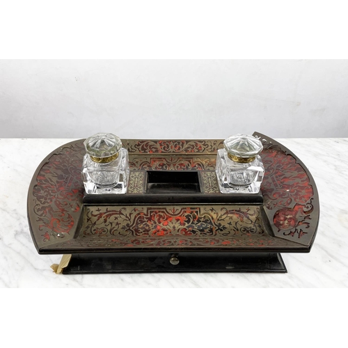 39 - BOULLE INK STAND, 19th century French tortoiseshell and brass with a pair of glass inkwells above a ... 