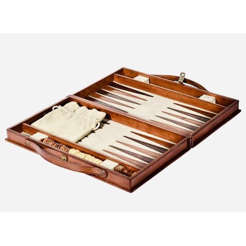 443 - BACKGAMMON SET, in tan leathered case, complete with counters, 7cm x 23cm x 40cm.