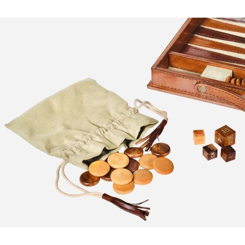 443 - BACKGAMMON SET, in tan leathered case, complete with counters, 7cm x 23cm x 40cm.