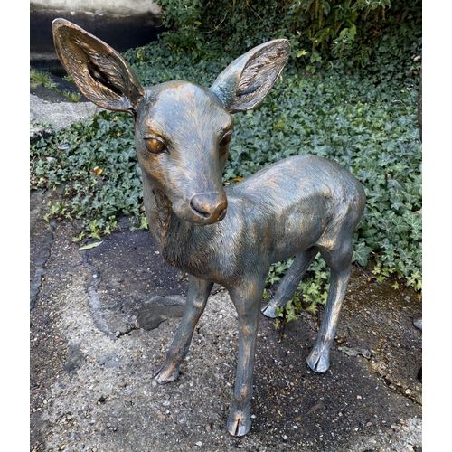 449 - CONTEMPORARY SCHOOL SCULPTURAL STUDIES, a set of two, depicting a Doe and Fawn, resin, in a bronzed ... 