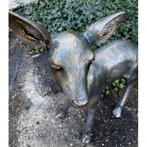 449 - CONTEMPORARY SCHOOL SCULPTURAL STUDIES, a set of two, depicting a Doe and Fawn, resin, in a bronzed ... 