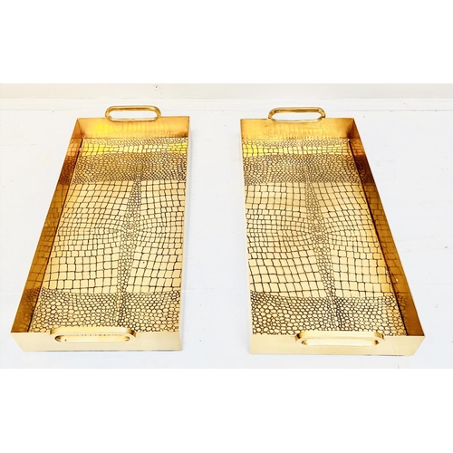 450 - COCKTAIL TRAYS, a pair, faux crocodile embossed gilt metal design, 8cm x 49cm x 23cm. (2)