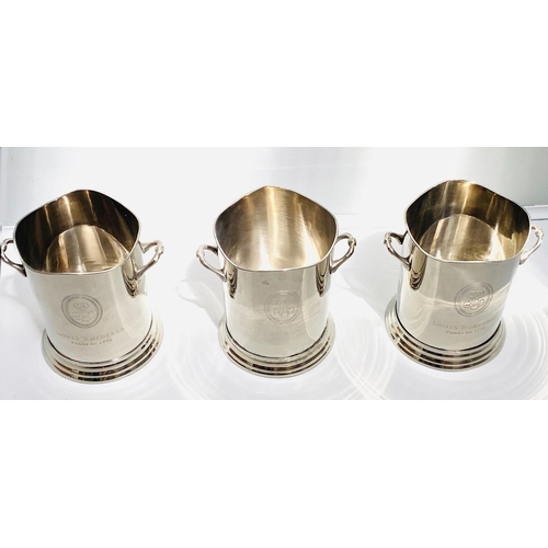 452 - CHAMPAGNE BUCKETS, set of three, 23cm H, polished metal, inscribed 