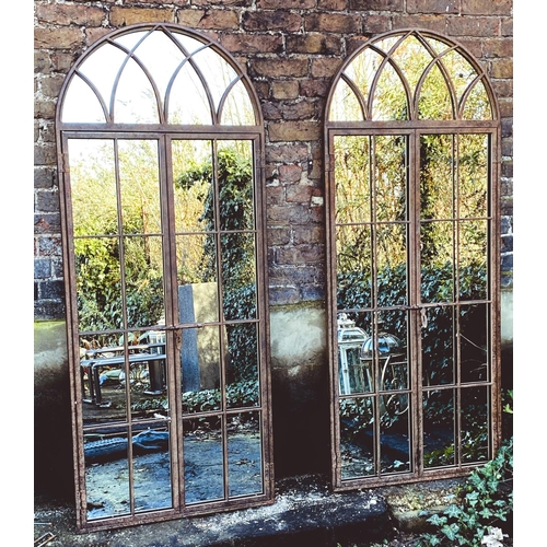 458 - ARCHITECTURAL GARDEN GATED MIRRORS, a pair, Georgian style, aged metal frames, 180cm high, 76cm wide... 