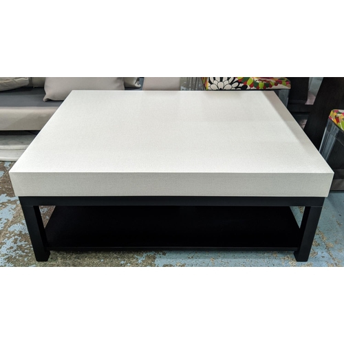 468 - LOW TABLE, 43cm high, 111cm long, 86cm wide, contemporary neutral fabric upholstered top, ebonised b... 