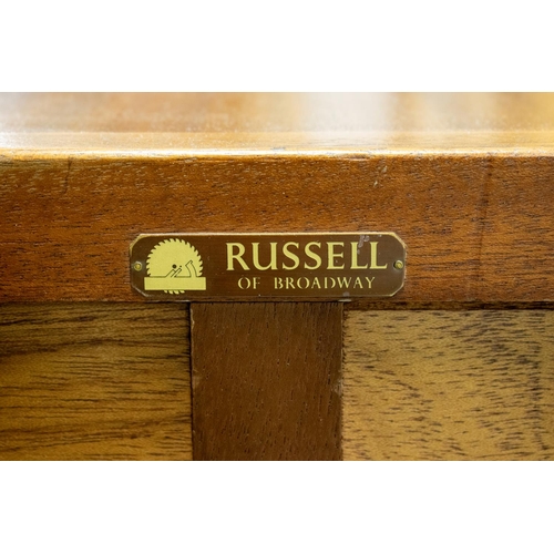 494 - GORDON RUSSELL HELIX SIDEBOARD, 89cm H x 123cm H x 47cm D, walnut with two incised doors, enclosing ... 