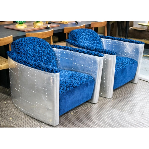 499 - AVIATOR STYLE ARMCHAIRS, 72cm H x 87cm W, aluminium with blue and black chenille upholstery. (2)