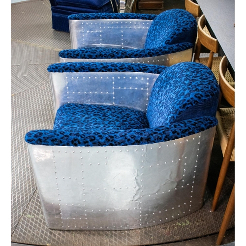 499 - AVIATOR STYLE ARMCHAIRS, 72cm H x 87cm W, aluminium with blue and black chenille upholstery. (2)