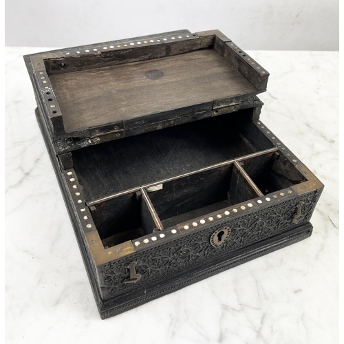 6 - JEWELLERY BOX, 19th century Anglo-Indian ornately carved ebony with hinged lid and fitted interior, ... 