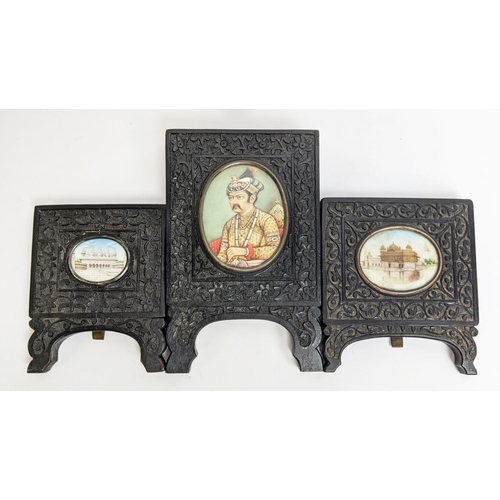 80 - INDIAN MINIATURES, a set of three, ornate carved wood frames, largest 14.5cm x 9.5cm overall. (3)