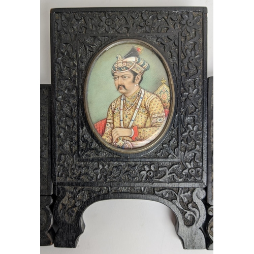 80 - INDIAN MINIATURES, a set of three, ornate carved wood frames, largest 14.5cm x 9.5cm overall. (3)