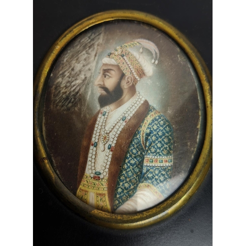 81 - PERSIAN PORTRAIT MINATURES, four, ebonised frames, largest 14.5cm x 12.5cm overall. (4)