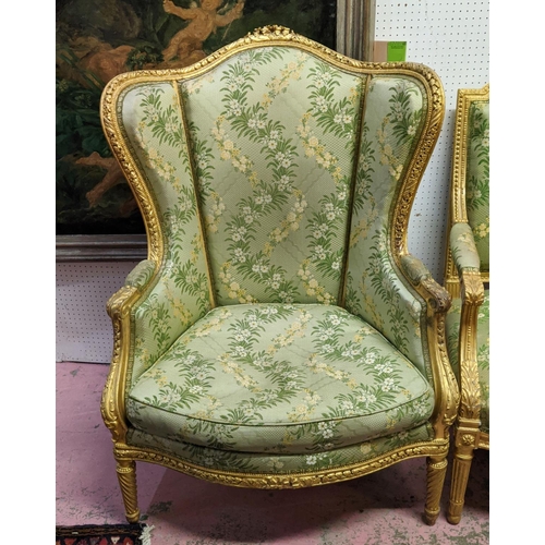 153 - LOUIS XVI STYLE BERGERE A OREILLE, 19th century gesso applied giltwood frame, green silk floral patt... 