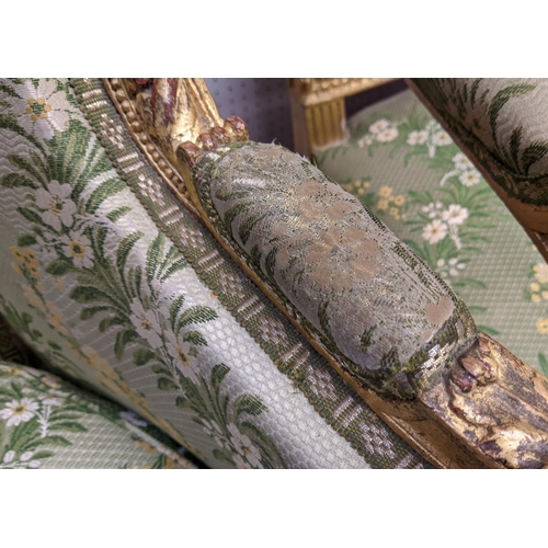 153 - LOUIS XVI STYLE BERGERE A OREILLE, 19th century gesso applied giltwood frame, green silk floral patt... 