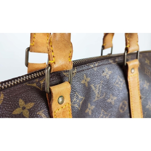 168 - LOUIS VUITTON KEEPALL 55, monogram coated canvas with leather handles and all around trims, padlock,... 