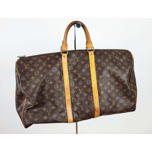 168 - LOUIS VUITTON KEEPALL 55, monogram coated canvas with leather handles and all around trims, padlock,... 