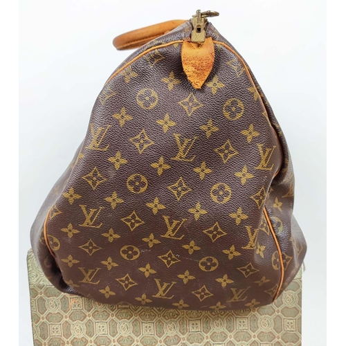 168 - LOUIS VUITTON KEEPALL 55, monogram coated canvas with leather handles and all around trims, padlock,... 