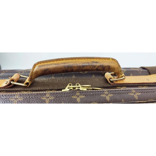 169 - LOUIS VUITTON SATELLITE 70 SUITCASE, made in France, monogram coated canvas with leather handle and ... 