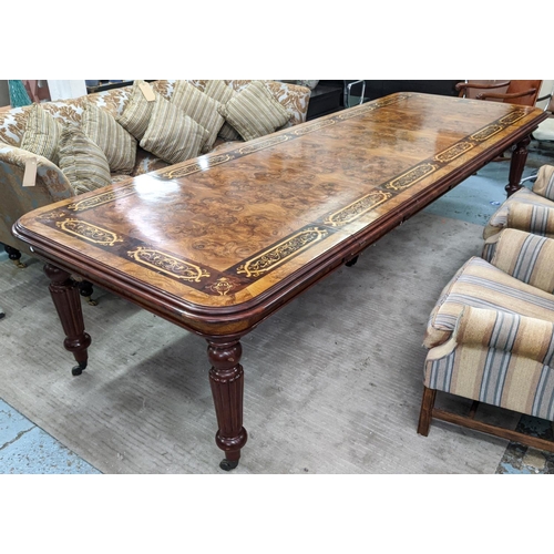 471 - EXTENDABLE DINING TABLE, walnut with inlay decoration, four leaves on reeded supports with castors, ... 