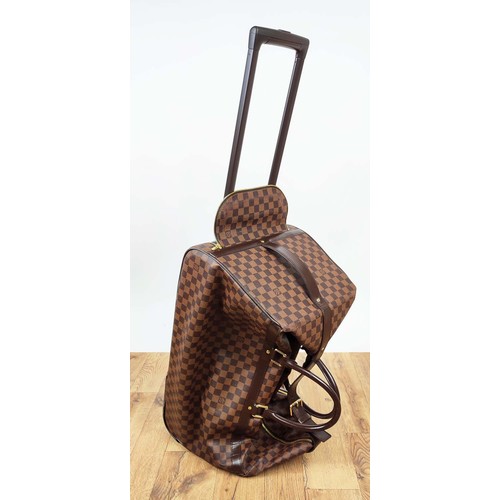 166 - LOUIS VUITTON DAMIER EBENE EOLE 60 ROLLING DUFFLE, coated canvas with leather handles, trims and top... 