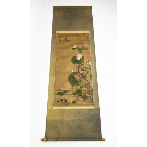 37 - CHINESE SCROLL, watercolour on silk depicting a pair of ducks beneath lotus blooms and butterflied w... 