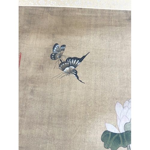 37 - CHINESE SCROLL, watercolour on silk depicting a pair of ducks beneath lotus blooms and butterflied w... 