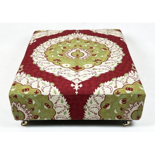 509 - HEARTH STOOL, 37cm H x 115cm W x93cm D, red and green crewel work covered on brass cstors.