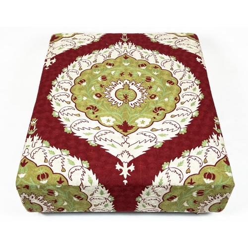 509 - HEARTH STOOL, 37cm H x 115cm W x93cm D, red and green crewel work covered on brass cstors.