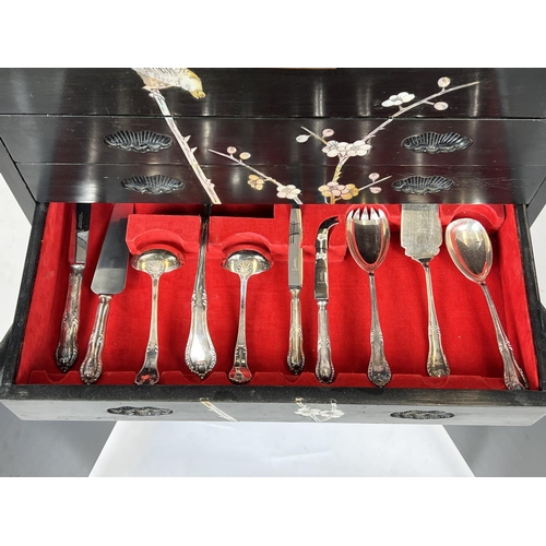 7 - MAPPIN AND WEBB TALL CANTEEN OF CUTLERY, black chinoiserie case with rising top enclosing fitted cut... 