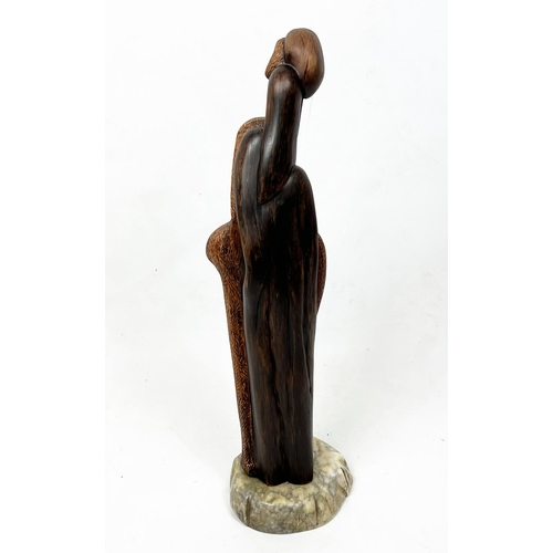 96 - BAHMAN FORSI (Iran, b.1934), 'Figure study', carved wood, 67cm H (including stand) on onyx base.