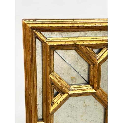 112 - WALL MIRROR, Italian giltwood rectangular with laid silver leaf mirror, octagonal and marginal plate... 