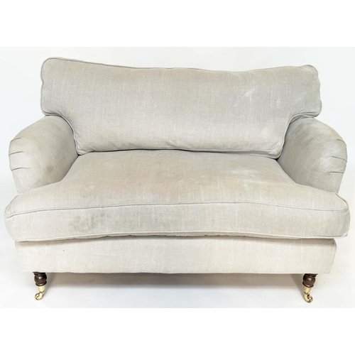 119 - HOWARD STYLE SOFA, with natural linen upholstery, feather filled cushions and turned front supports,... 