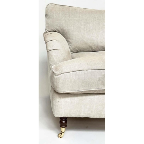 119 - HOWARD STYLE SOFA, with natural linen upholstery, feather filled cushions and turned front supports,... 