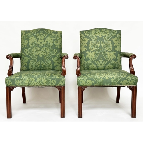 126 - GAINSBOROUGH ARMCHAIRS, a pair, George III design with arched backs, scroll carved arms and brass st... 