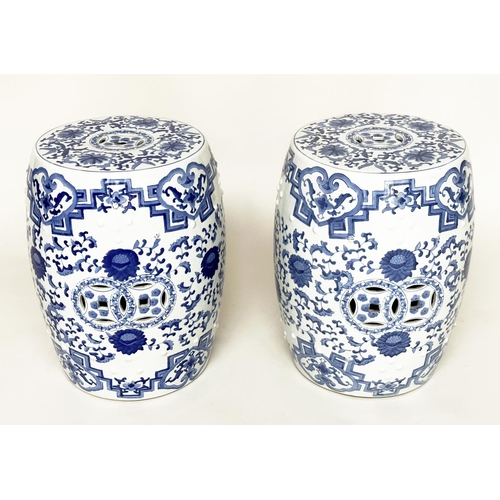 132 - CHINESE BARREL STOOLS, a pair, blue and white ceramic with pierced tops, 47cm H. (2)