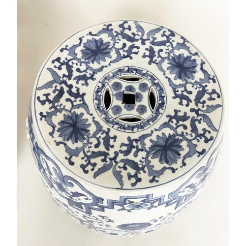 132 - CHINESE BARREL STOOLS, a pair, blue and white ceramic with pierced tops, 47cm H. (2)