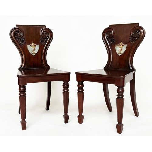 135 - HALL CHAIRS, a pair, 19th century mahogany with scroll and shield backs, coat of arms and facetted f... 