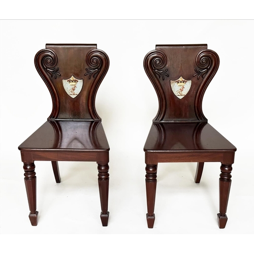 135 - HALL CHAIRS, a pair, 19th century mahogany with scroll and shield backs, coat of arms and facetted f... 