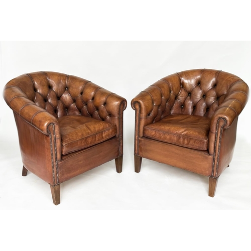 143 - TUB ARMCHAIRS, a pair, deep buttoned mid brown studded hide leather with curved back and scroll arms... 