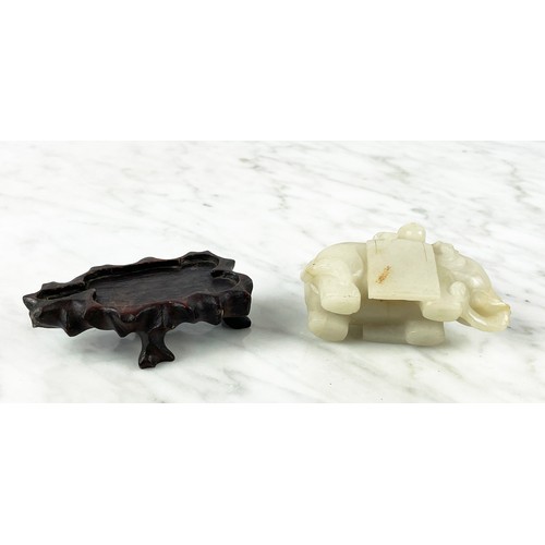 25A - CHINESE PALE CELEDON JADE CARVED ELEPHANT AND BOY, 9cm L x 8cm H.